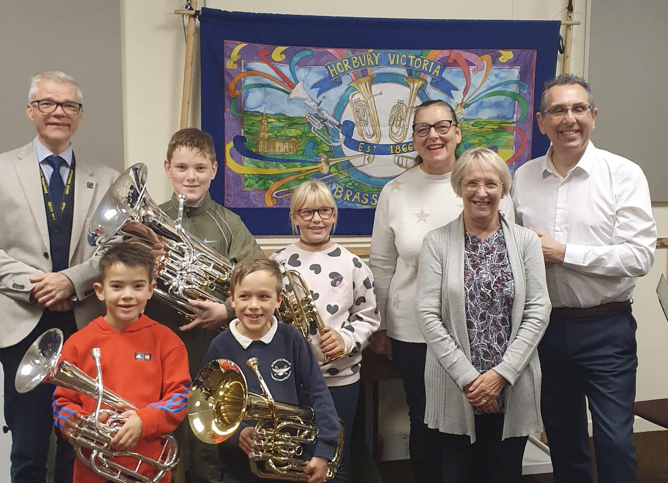 Local councillors presenting new instruments to our learner band players.